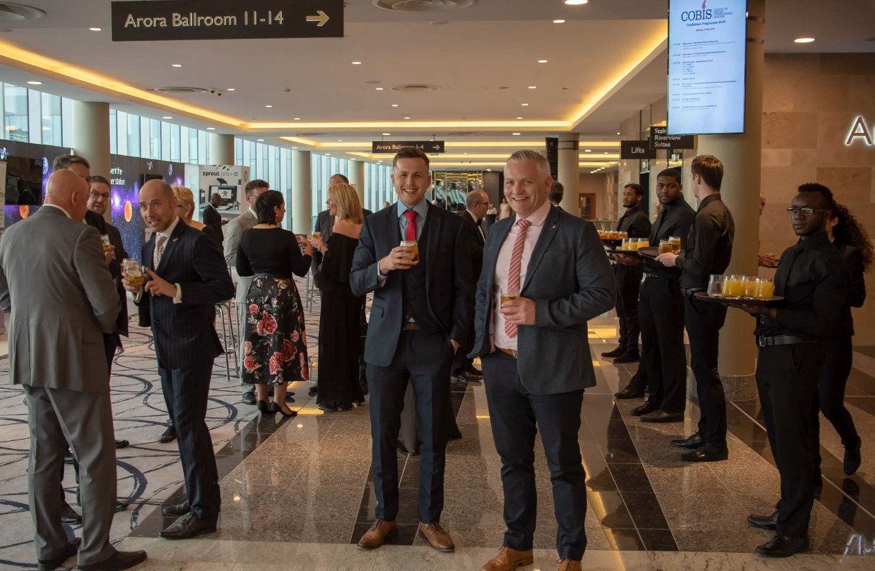 Corporate event photographer London — delegates networking at a conference