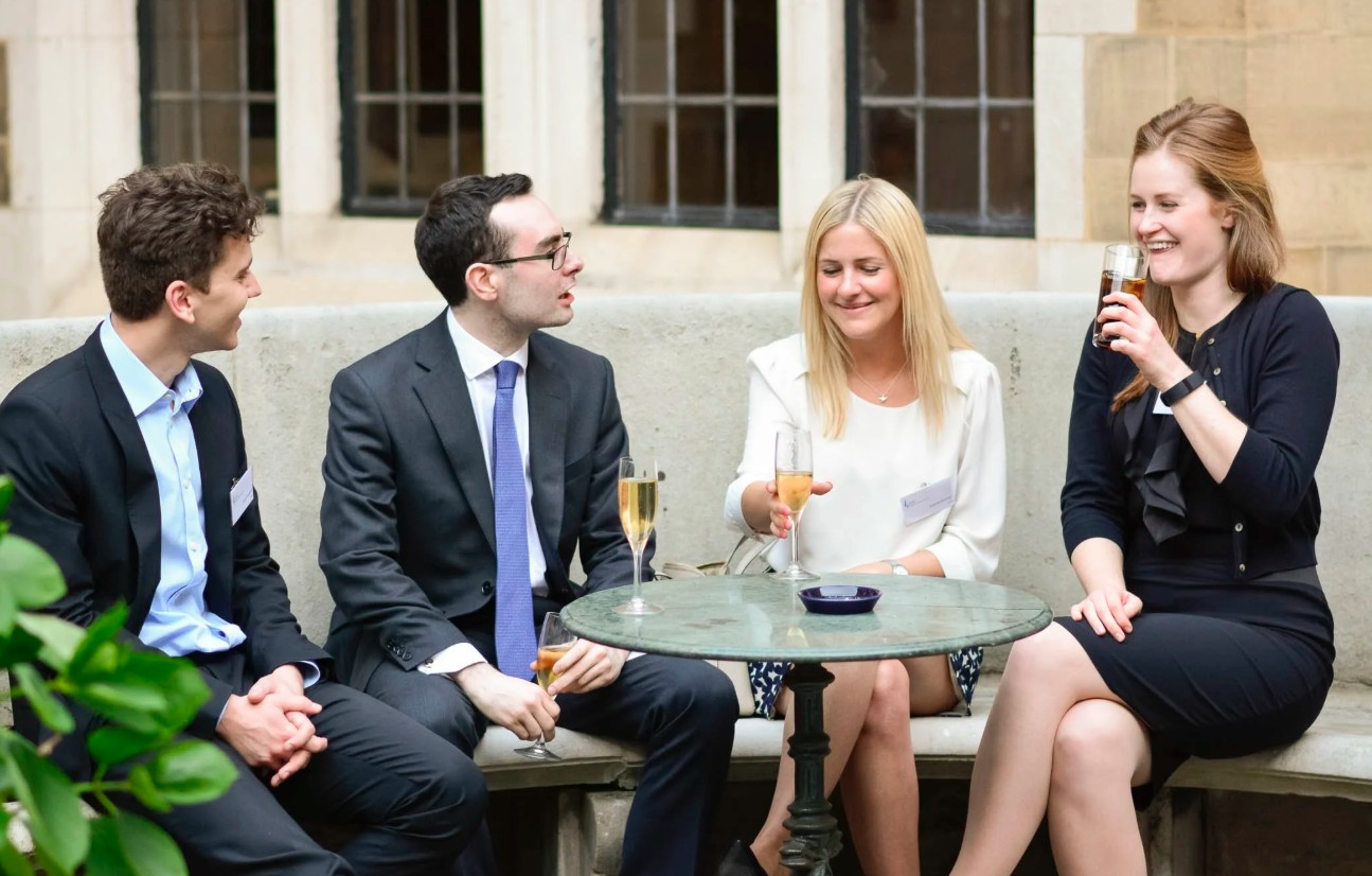 Corporate event photography — professionals networking at a London business event